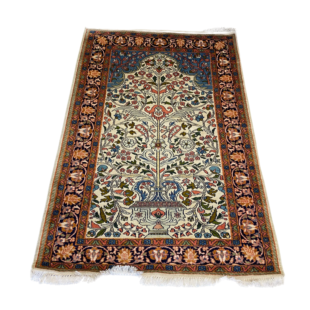 Hand knotted silk rug